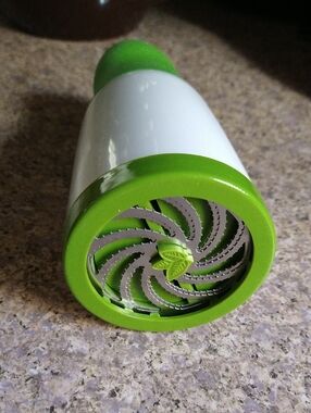 Green and White Handheld Herb Prep Tool